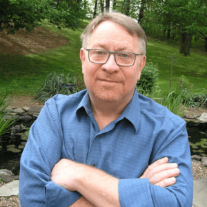 gary treer in front of pond