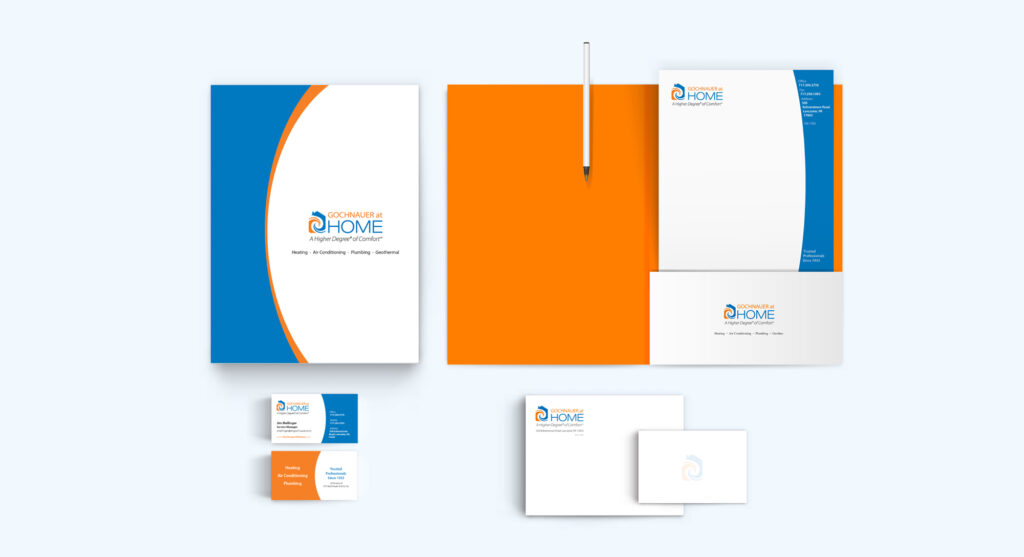 Gochnauer at Home branded stationery set including business cards, letterhead, envelopes, and folders, designed for a professional HVAC and home comfort company