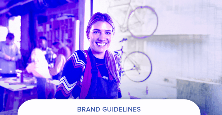 woman business owner smiling in a bicycle shop